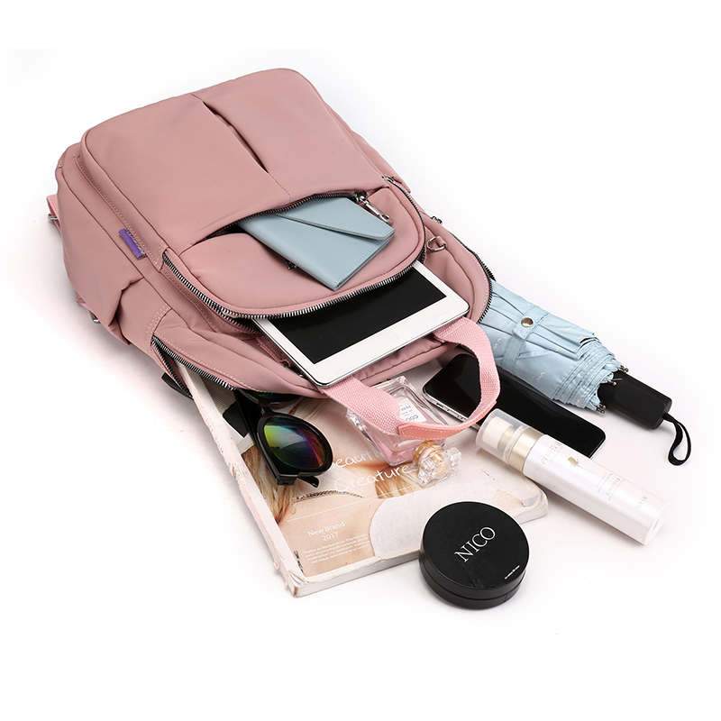 Water-resistant anti-theft backpack, ideal for daily commute. USB charging & laptop sleeve.