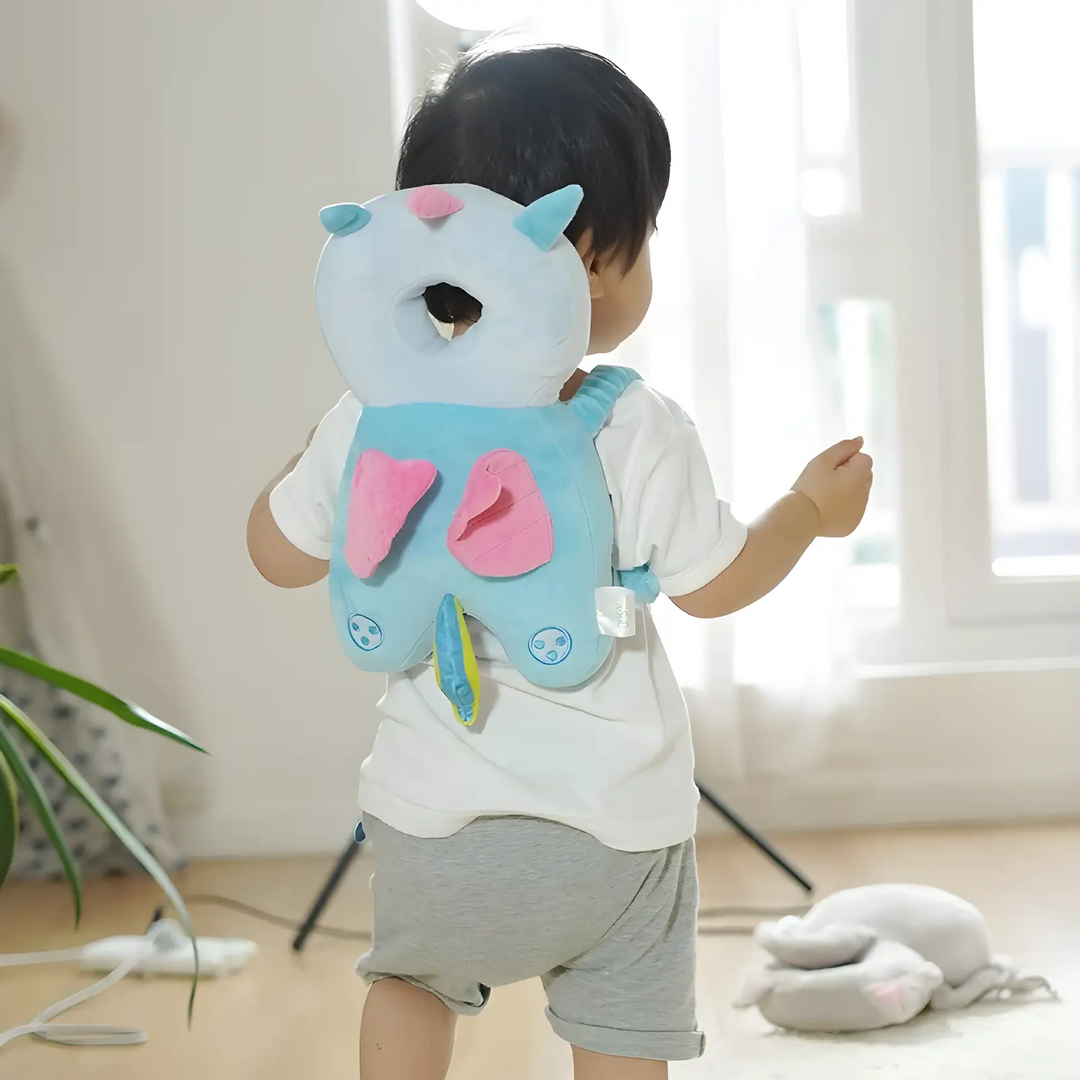 Plush baby head safety cushion, provides gentle fall protection for active infants and toddlers. Unisex design.