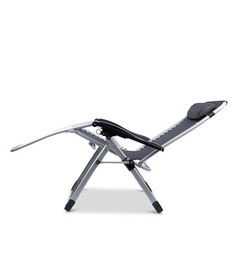 Portable cream zero gravity lounge chair with adjustable recline for outdoor comfort.