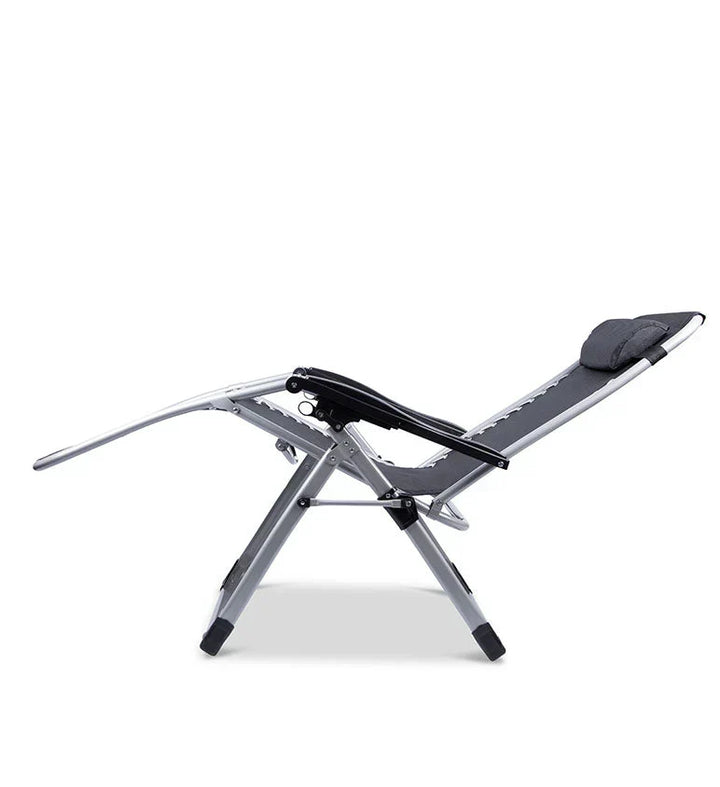 Portable cream zero gravity lounge chair with adjustable recline for outdoor comfort.