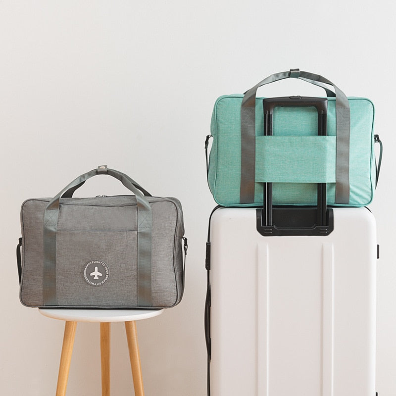 Versatile unisex carry-on luggage with trolley sleeve. Great as a compact travel bag, overnight bag, or efficient weekender luggage.