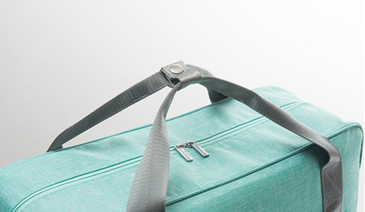 Unisex compact carry-on travel bag with trolley sleeve. Convenient luggage for any trip, whether it's an overnight or weekender.