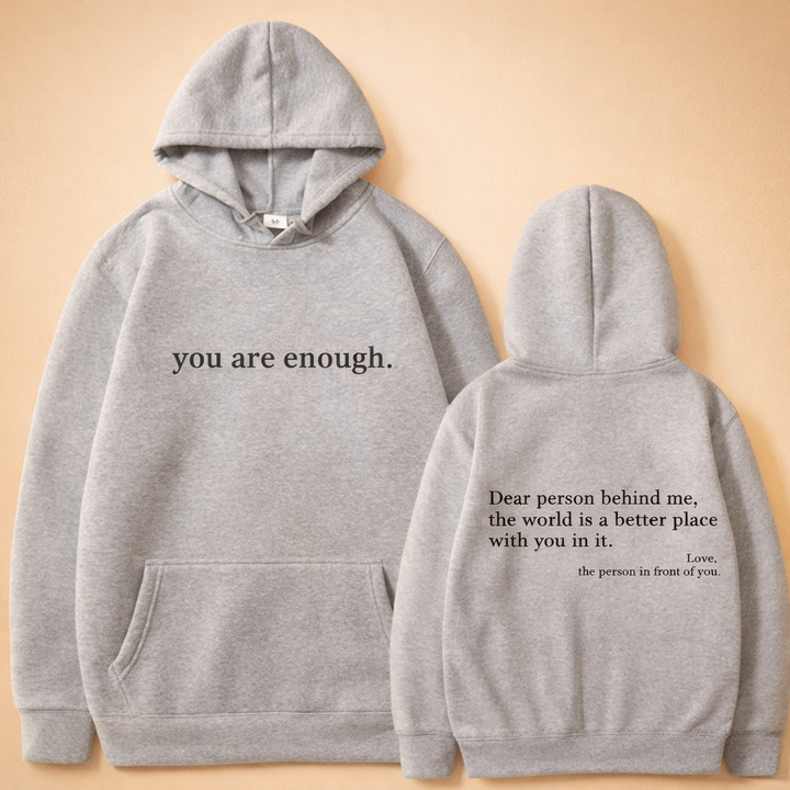 Relaxed fit unisex drawstring hoodie, ideal casual outerwear for men & women, featuring a practical kangaroo pocket.