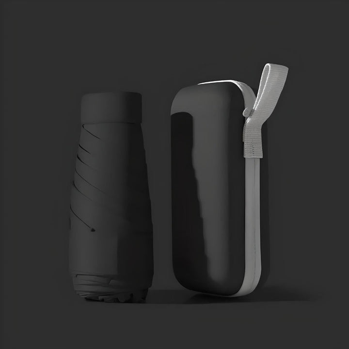 Unisex compact travel umbrella in black with waterproof case, ideal for rain & sun protection. Windproof & UV resistant.