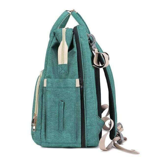 New parent gift: versatile nappy bag with portable bassinet, making parenting easier and organized.