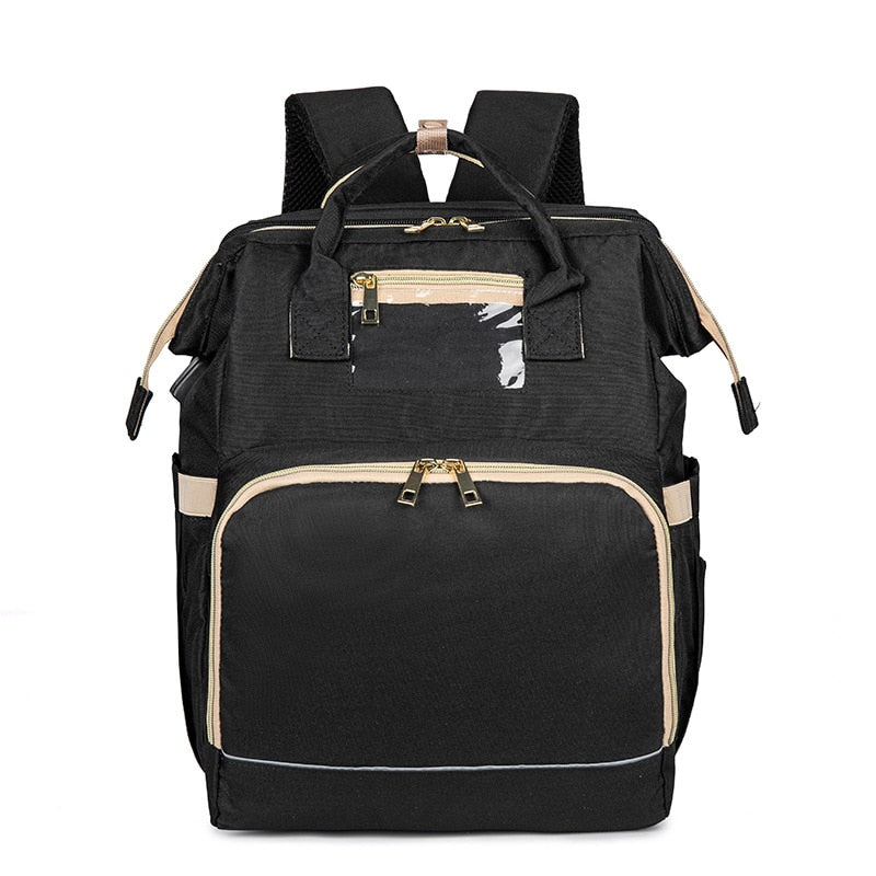Unisex diaper travel bag attached to a stroller, functioning as a practical organizer for parents.