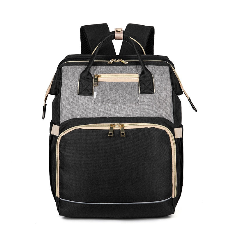 Stylish unisex baby backpack in a neutral color, suitable for all new parents & caregivers.