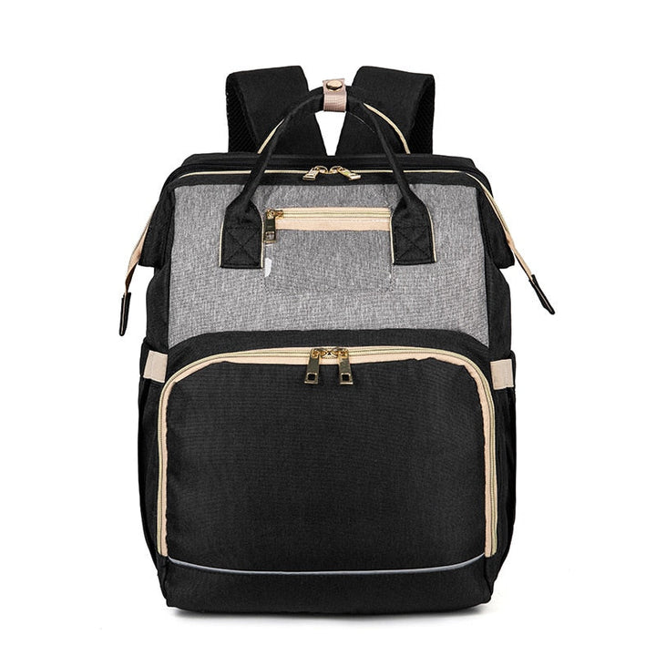 Stylish unisex baby backpack in a neutral color, suitable for all new parents & caregivers.