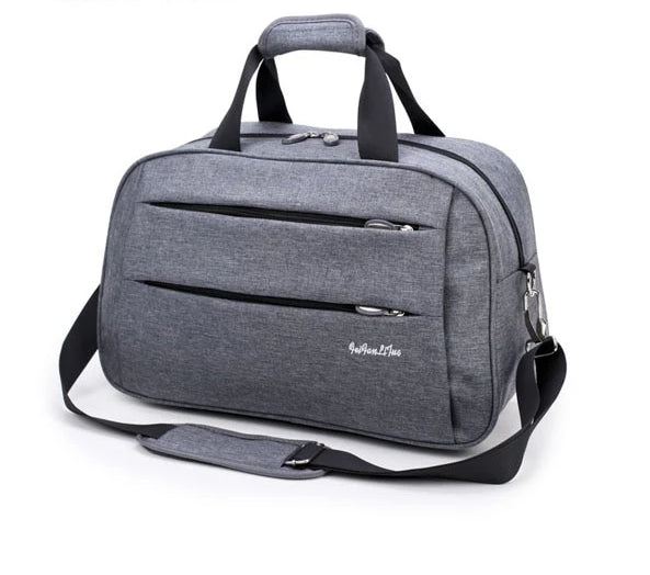 Unisex convertible carry-on bag beside a standard duffel, highlighting its compact, airline-approved size.