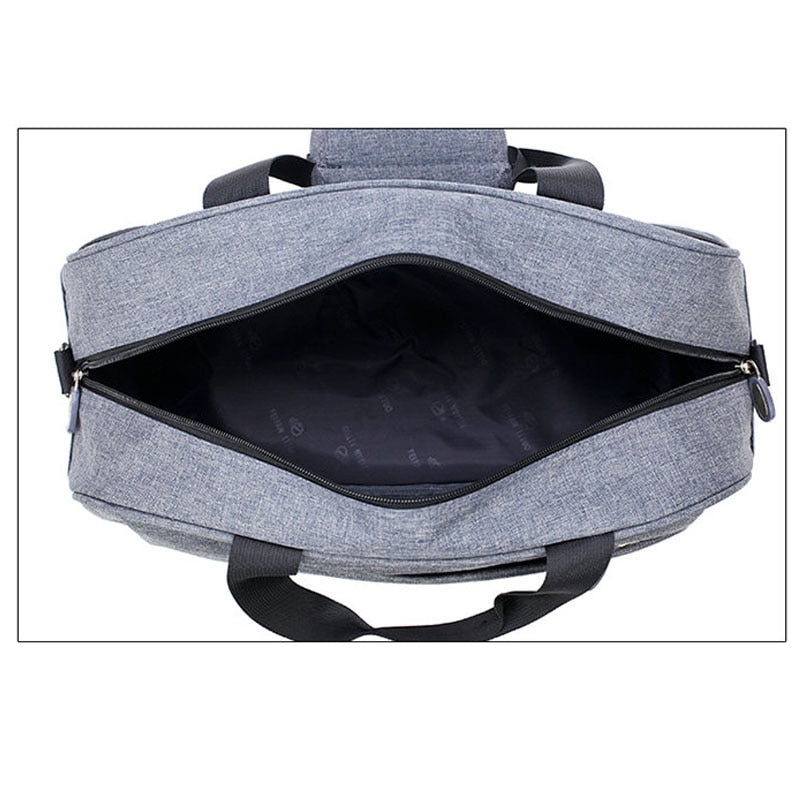 Front view of unisex travel bag: convertible carry-on with secure zip pockets, perfect for weekend getaways.