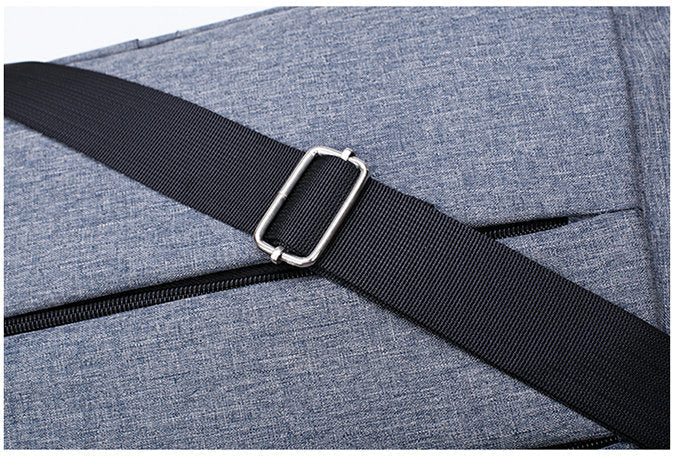 Stylish unisex convertible duffel bag carried by hand, ideal lightweight weekend travel bag.