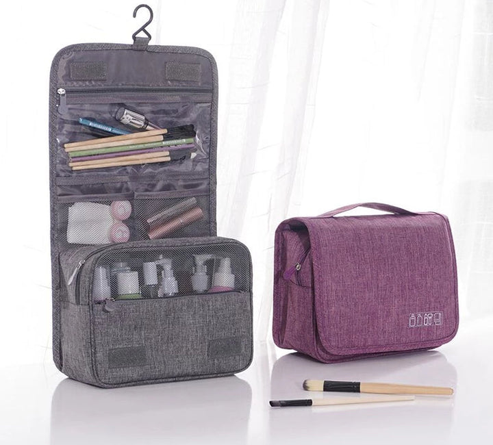 Unisex Deluxe Hanging Toiletry Bag. Perfect travel organizer for cosmetics & grooming essentials.