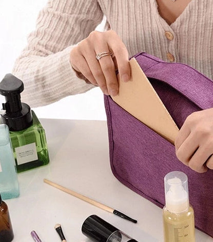 Essential unisex travel accessory: Deluxe hanging toiletry bag. Organize cosmetics & grooming kit.