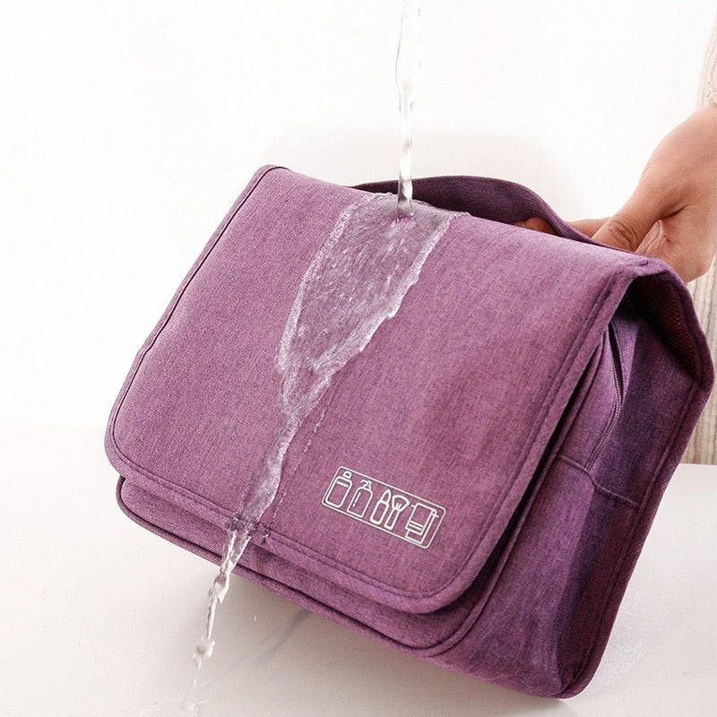 Functional unisex deluxe hanging toiletry bag. Perfect travel organizer for efficient grooming storage.
