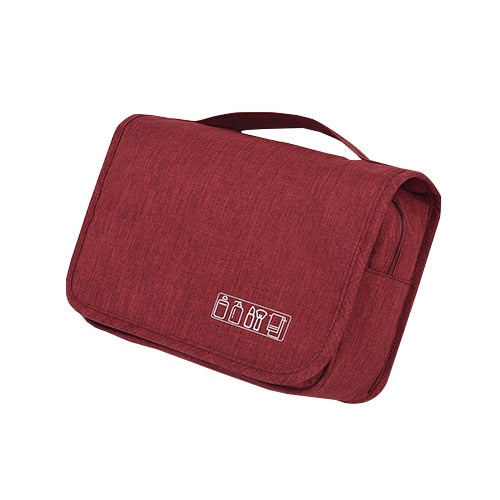Waterproof unisex deluxe toiletry bag. Secure travel organizer for cosmetics & grooming kit.