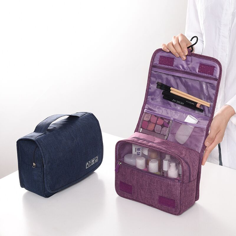 Durable unisex deluxe hanging toiletry bag. Reliable travel organizer for bathroom & luggage.