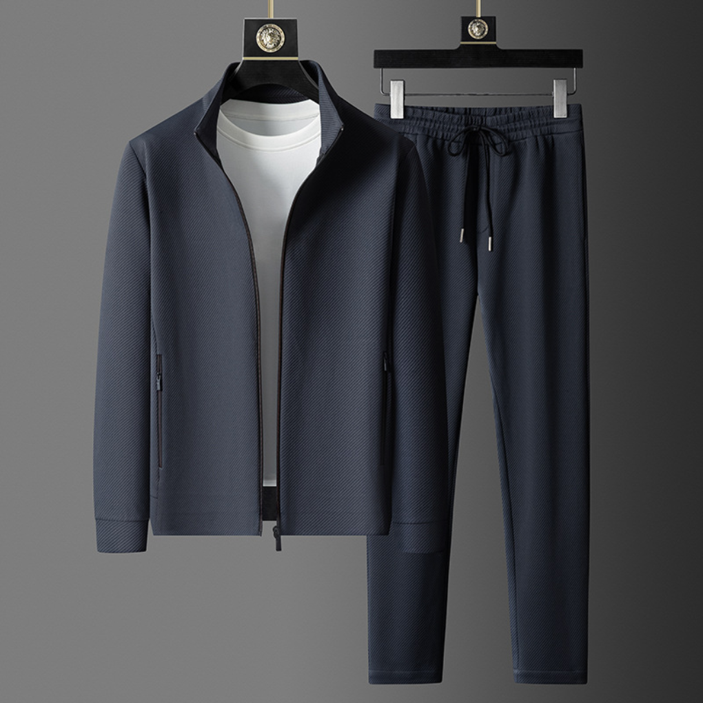 Unisex Everyday Comfort Tracksuit, perfect for casual wear, loungewear & athletic style. Soft fabric two-piece set.