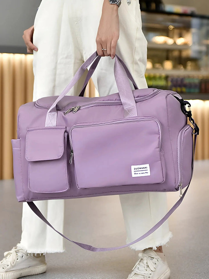 Unisex extra-large waterproof duffel bag, perfect for weekend travel & gym use.