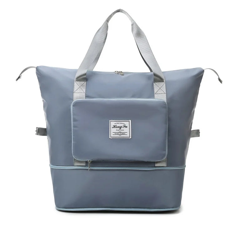 Unisex FlexCarry folding suitcase for versatile travel, perfect as a carry-on duffel or weekend bag.