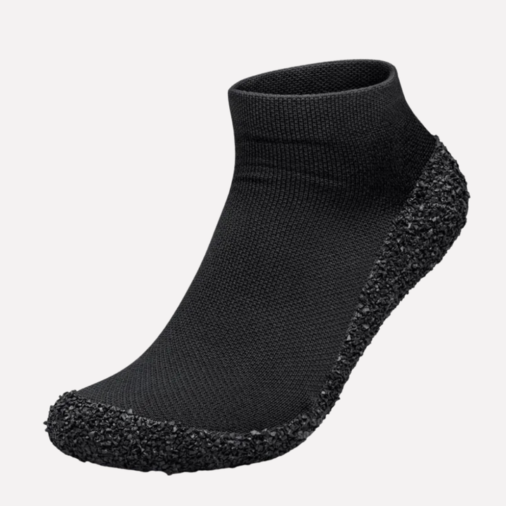 Comfortable unisex slip-on sock shoes, ideal for casual wear with a lightweight, flexible design and foot protection.