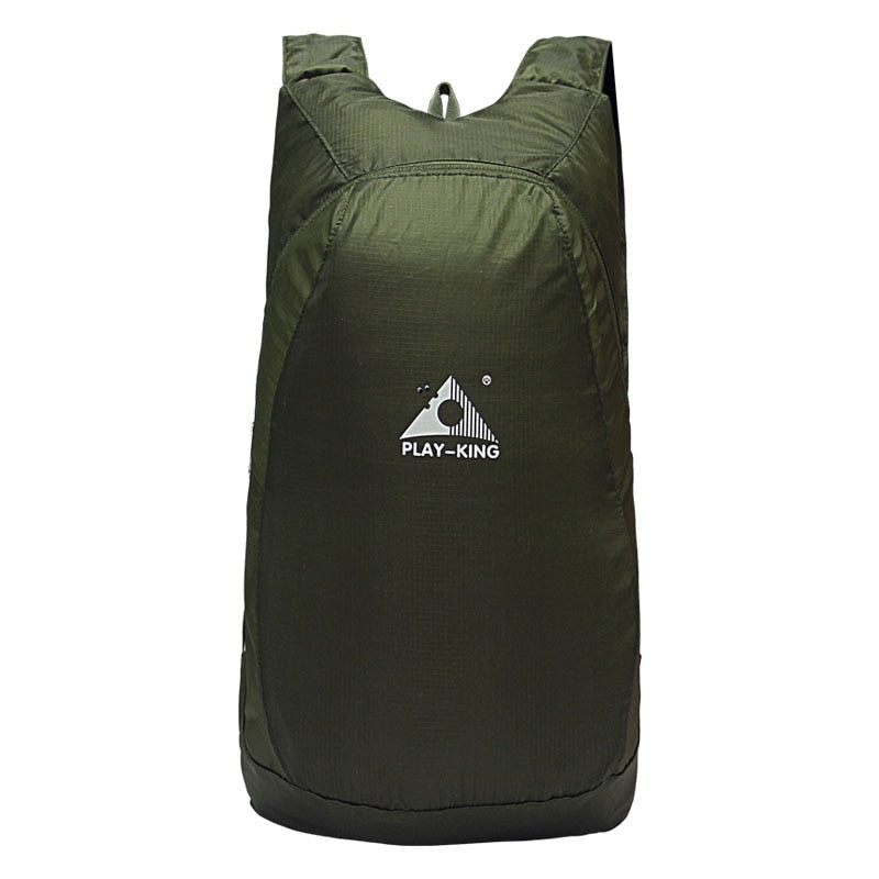 Compact folded 20L water-resistant travel backpack, shown in a portable, ready-to-go state.