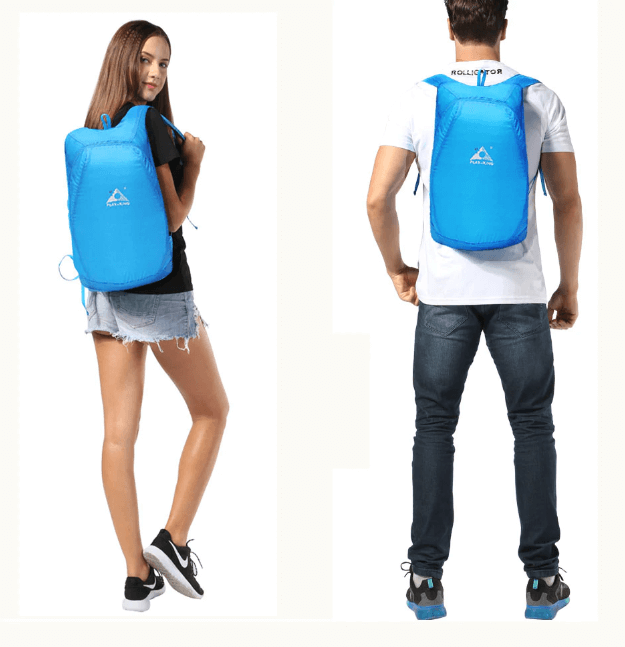 Unfolded 20L unisex water-resistant travel backpack, showcasing main compartment & capacity.