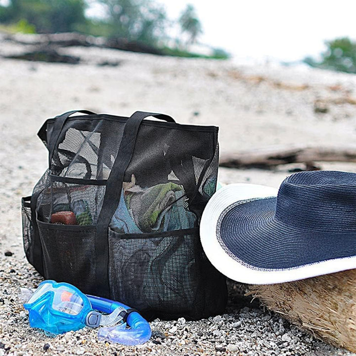 Foldable mesh beach tote, a lightweight travel organizer with 9 pockets for family vacations & pool days.