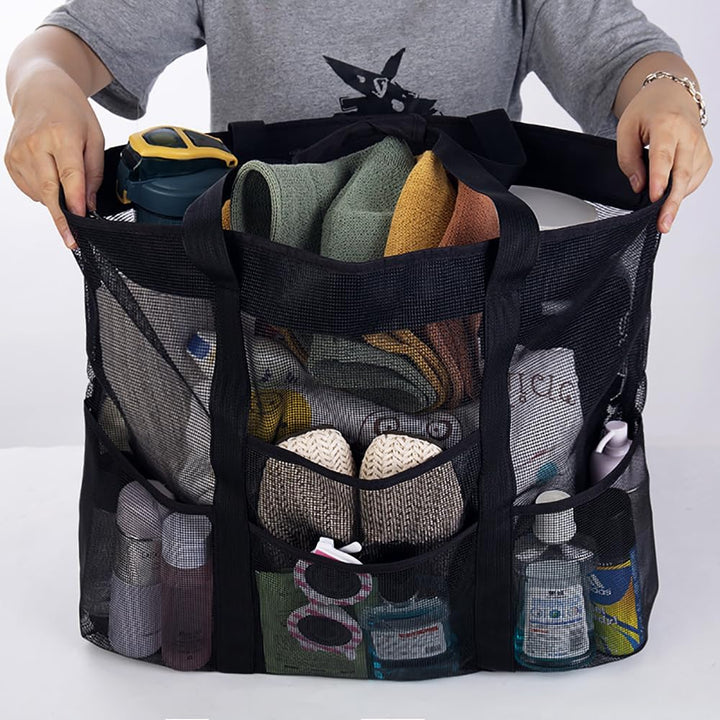 Spacious mesh beach bag with 9 deep pockets for organizing family essentials; foldable for easy storage.