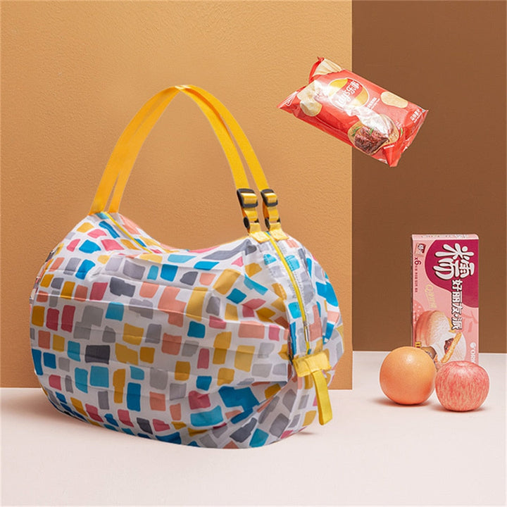 Compact foldable reusable shopping tote for travel & storage. Perfect for groceries, utility & eco-friendly use.