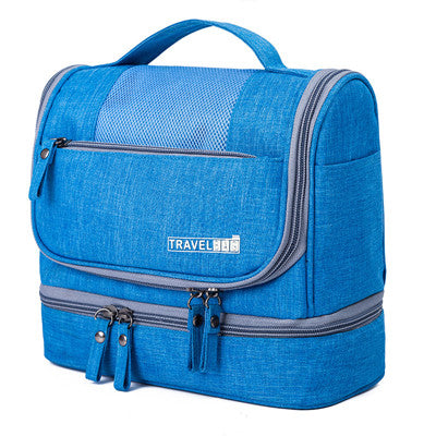 Durable nylon waterproof travel toiletry bag with multi-compartments for vacation luggage.