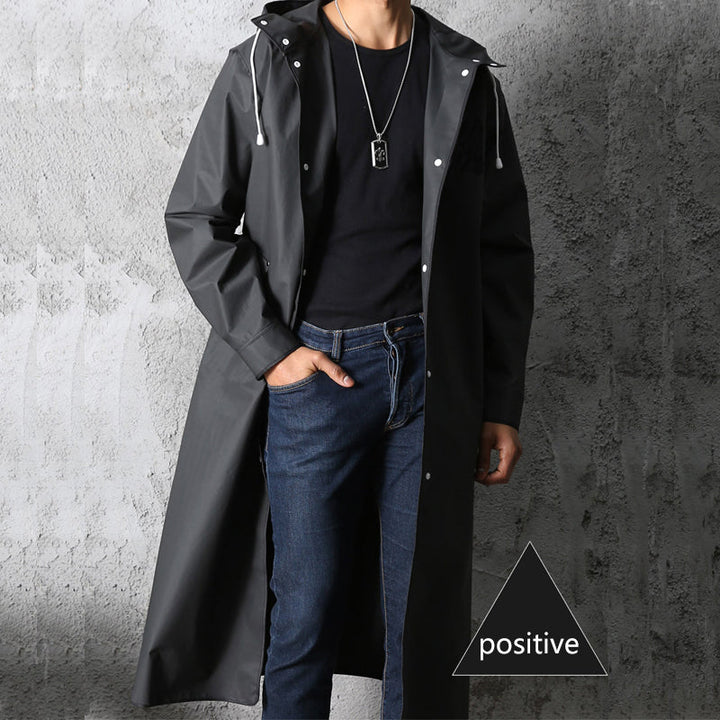 Unisex long waterproof raincoat with hood, ideal for all-weather outdoor adventures & travel.