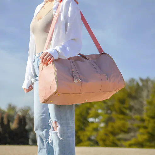 Luxury unisex travel duffel & garment bag. Wrinkle-free design, ideal compact carry-on for stylish business trips.