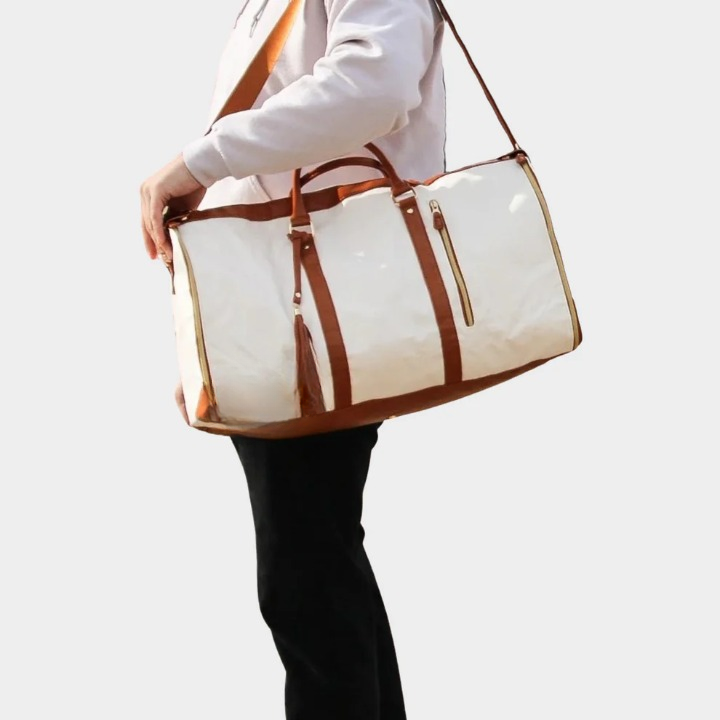 Multifunctional vegan leather garment bag & duffel. Wrinkle-free travel accessory, ideal for business and leisure.