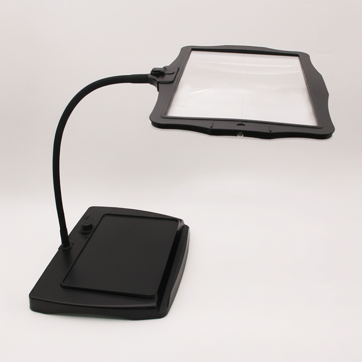 Unisex Magnifying LED Desk Lamp with adjustable gooseneck for reading, crafts, and detail work. Rechargeable vision aid.