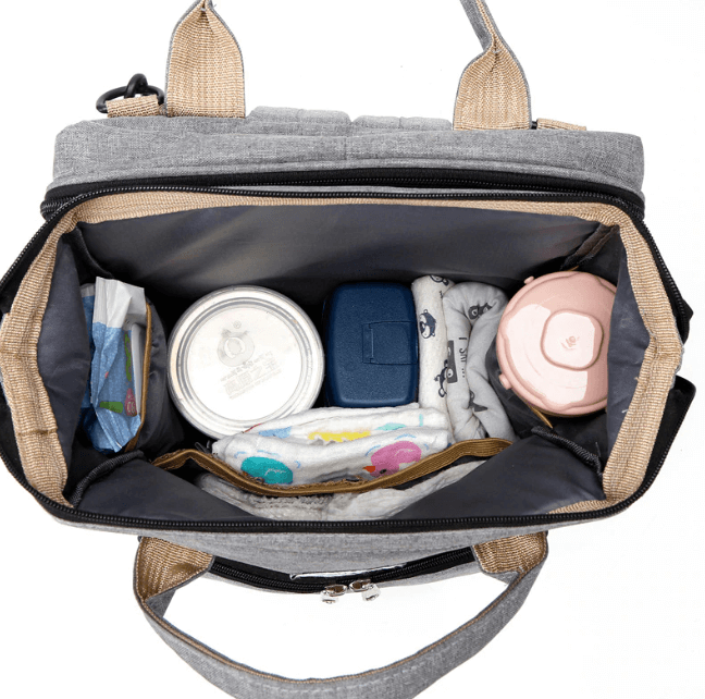 Durable waterproof baby travel backpack, unfolds into a portable bed & nappy changing station.