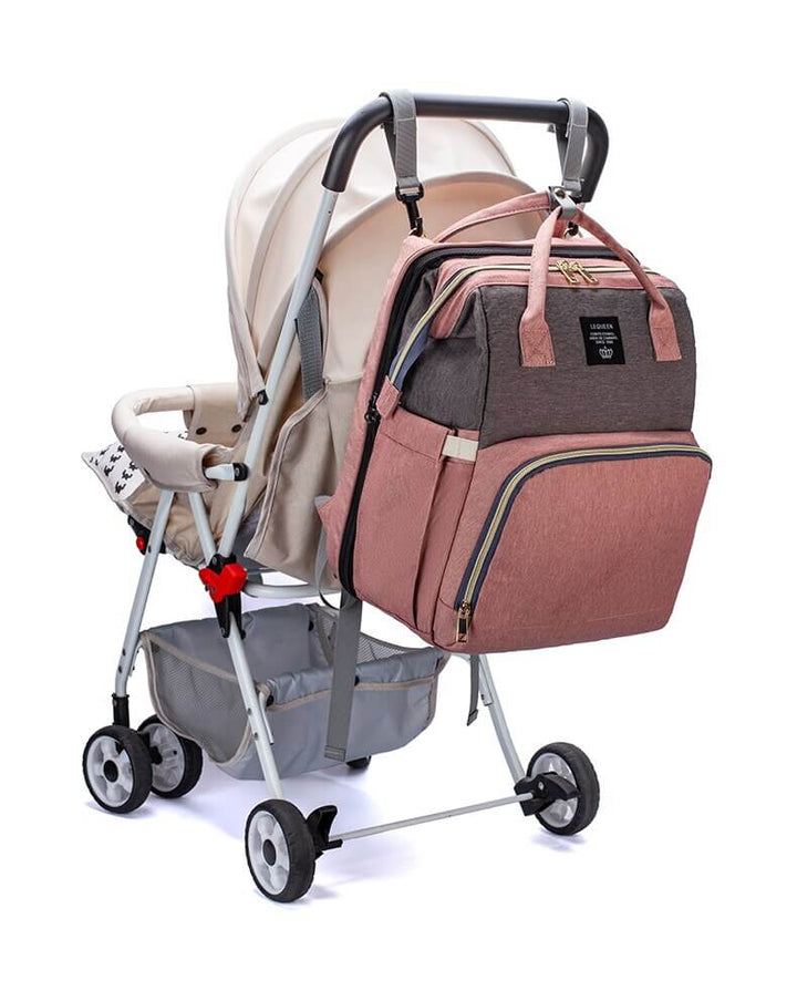 Smart parenting solution: unisex diaper bag, portable baby bed, and travel backpack in one.