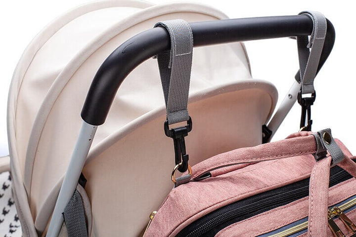 Unisex multi-function travel backpack, featuring a portable baby bed and spacious diaper bag.
