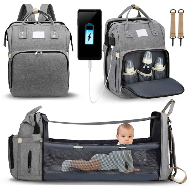 Waterproof nappy bag and portable bed, a versatile travel backpack for baby's comfort.