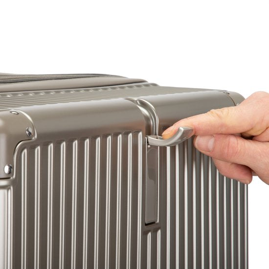 Premium hardshell carry-on with quiet spinner wheels, USB port, and convenient cup holder.