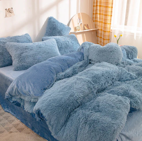 Detailed view of the ultra-soft plush fabric of a velvet duvet cover, offering cozy winter warmth.