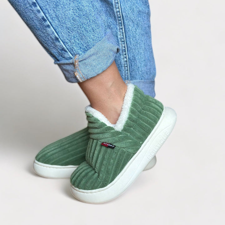 Unisex ultra-warm plush slippers with ergonomic design for indoor comfort & cozy footwear. Perfect gift.
