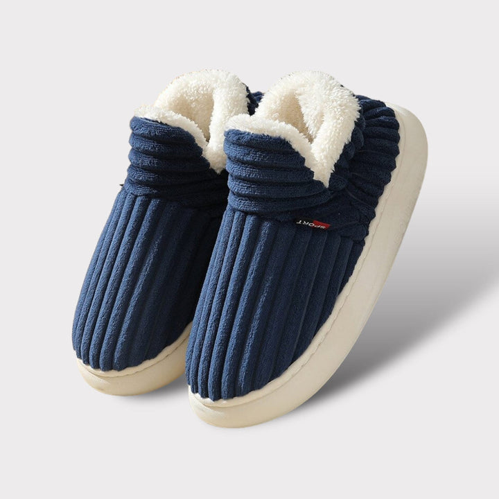 Cozy plush slippers for men & women, offering ultra-warm comfort with ergonomic support for indoor wear.