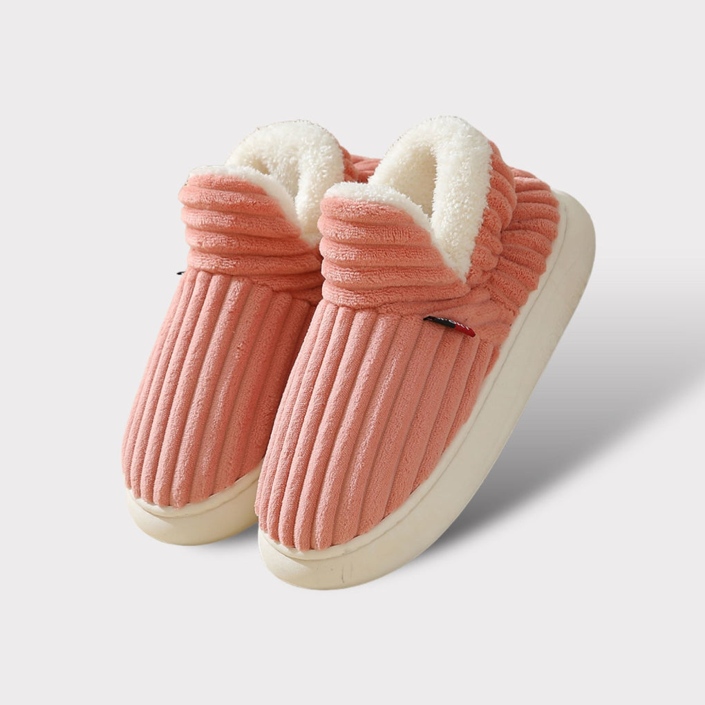 Ergonomic plush unisex slippers, designed for supreme indoor comfort, warmth, and a cozy footwear experience.