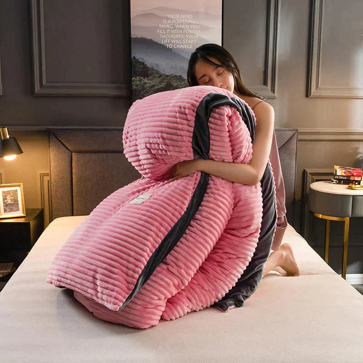 Close-up of the velvety texture of a DreamWeave fleece duvet cover; cozy and soft.