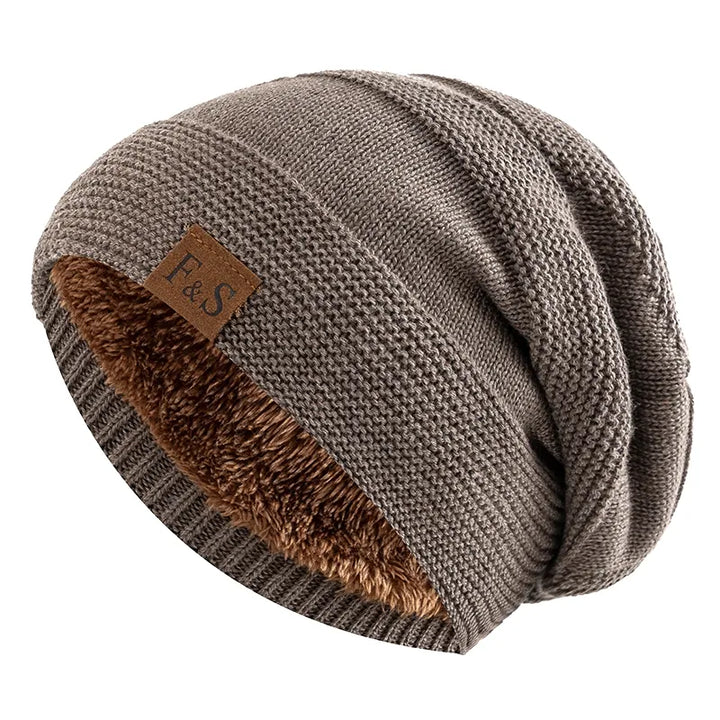 Unisex warm winter beanie with soft fleece lining, ideal for cold weather protection.