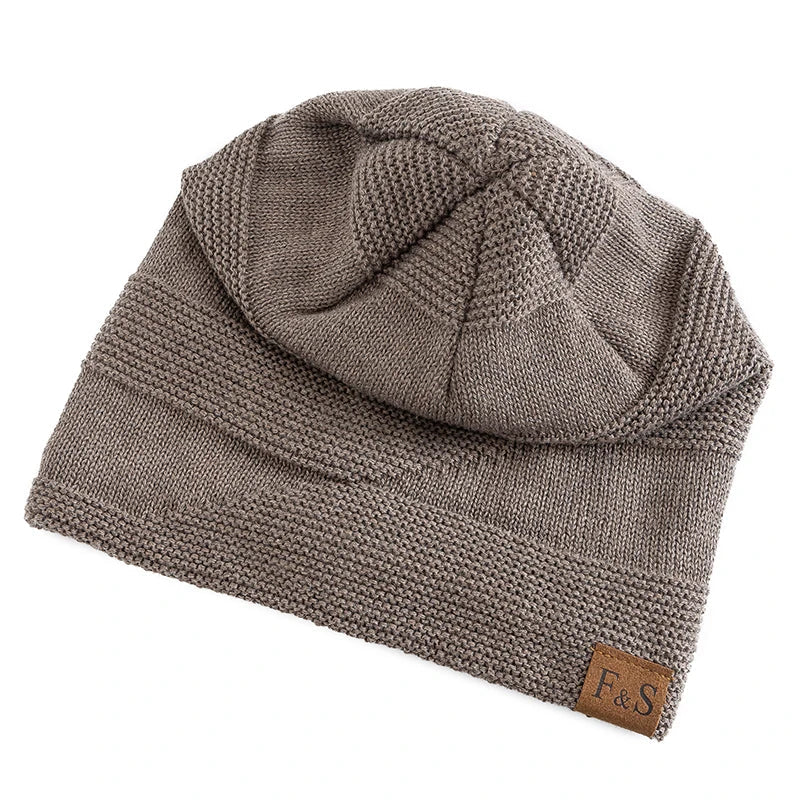 Stay cozy with this warm Luna winter beanie, a knit hat designed for ultimate cold weather protection.