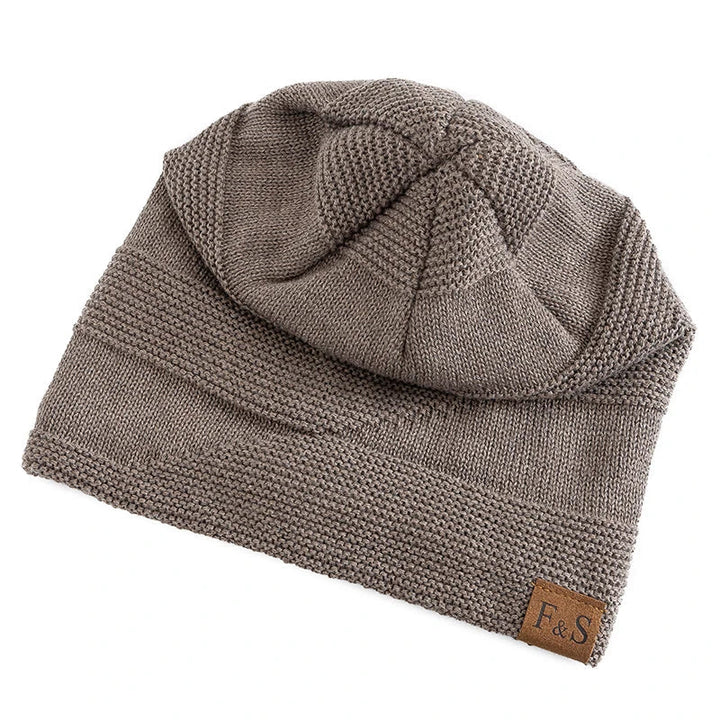 Stay cozy with this warm Luna winter beanie, a knit hat designed for ultimate cold weather protection.