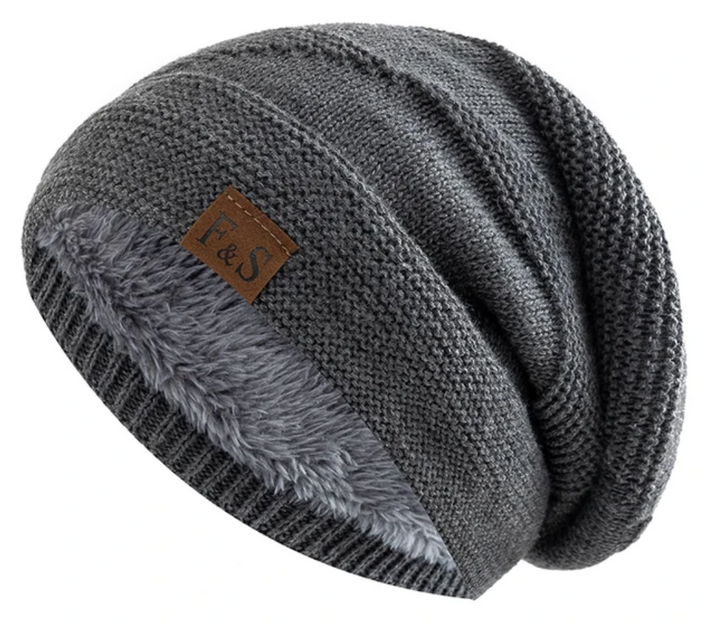 Soft fleece-lined beanie, a perfect unisex knit hat for winter fashion and comfortable headwear.