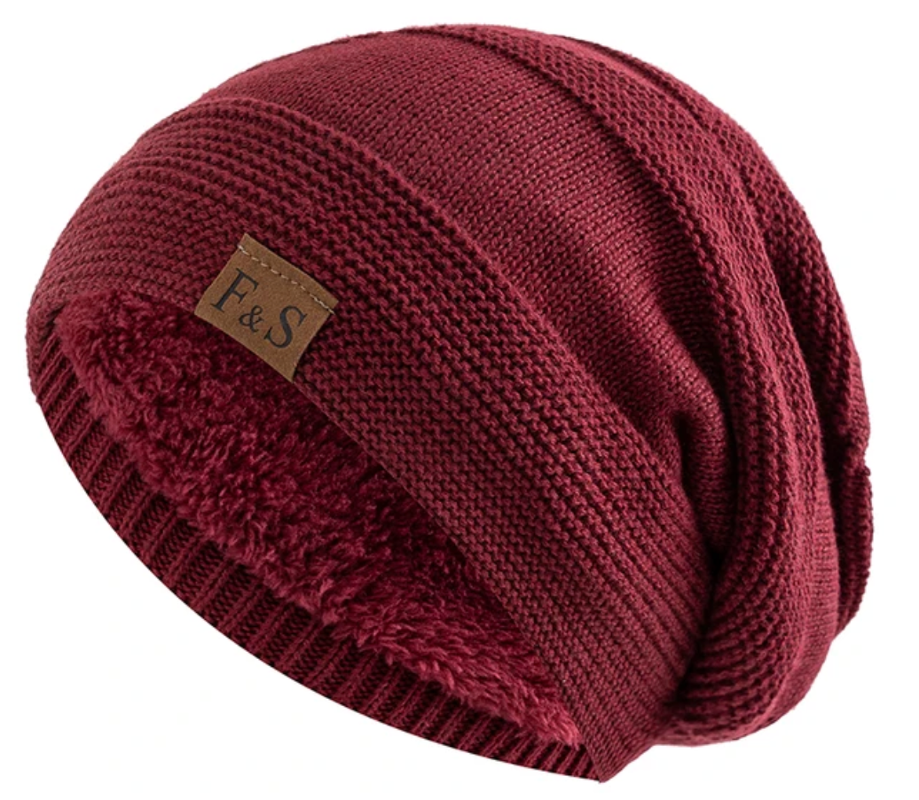 Cozy knit winter hat, Luna, with a plush fleece lining for extra warmth and comfort.