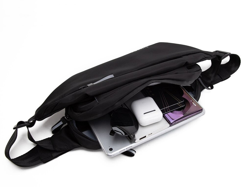 Unisex water-resistant fanny pack with multi-pockets for hands-free travel & sport essentials.